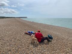 Lunchtime sandwich and a rest on the shingle beach, approaching Seaford
